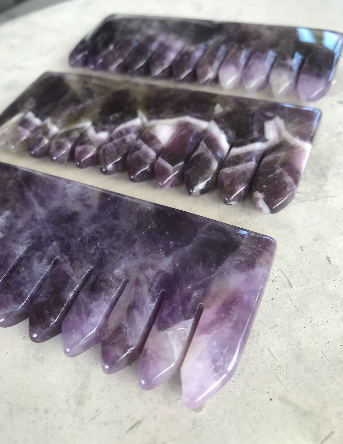 hand carved rose quartz and amethyst crystal comb